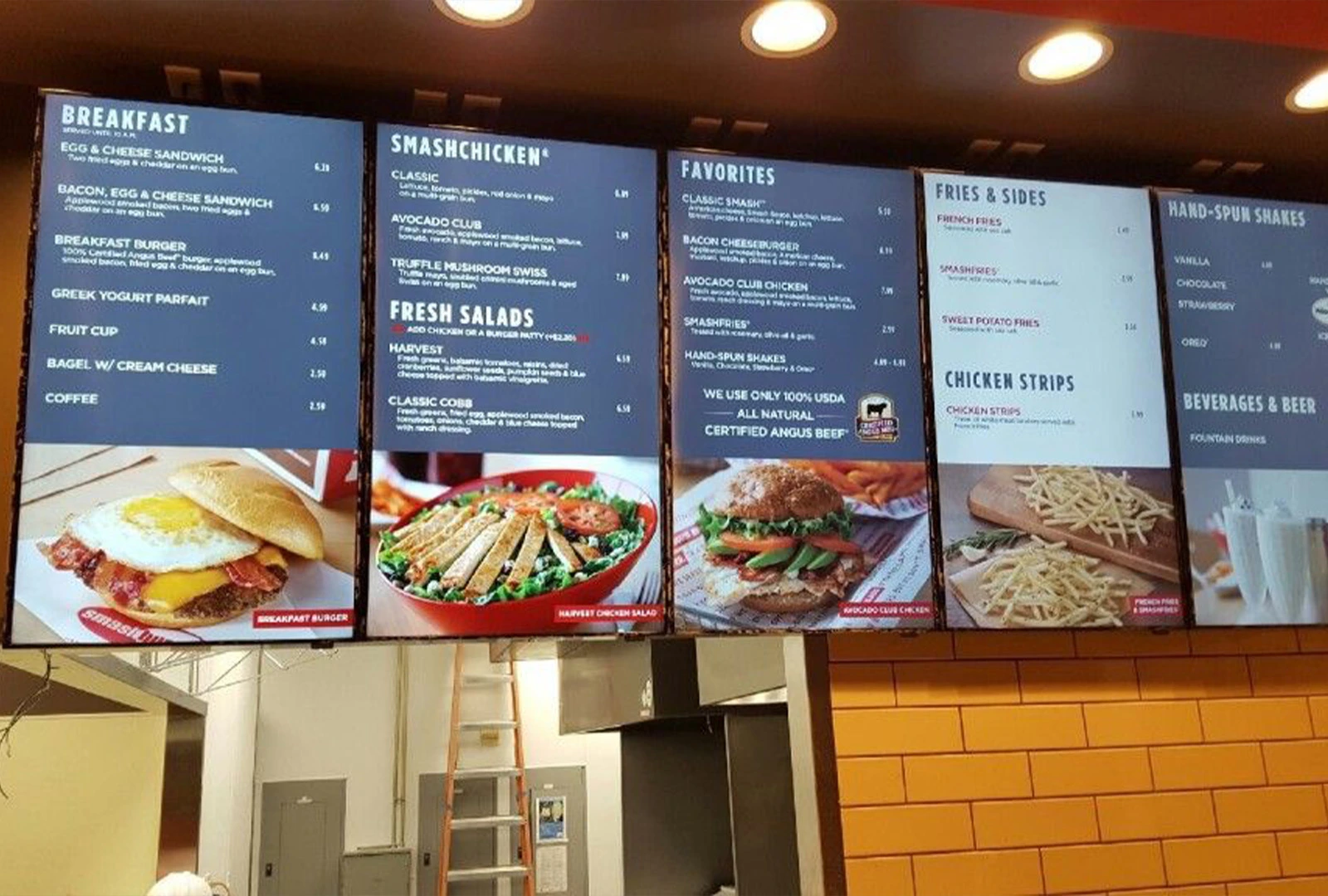 Digital menu boards inside a restaurant