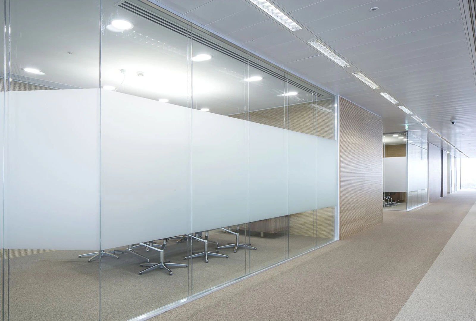 Frosted privacy film on office glass walls