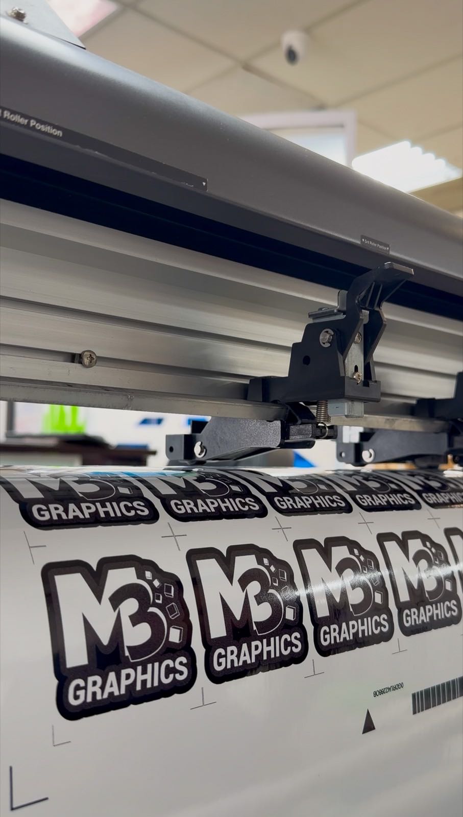 M3 Graphics stickers coming off the large-format printer