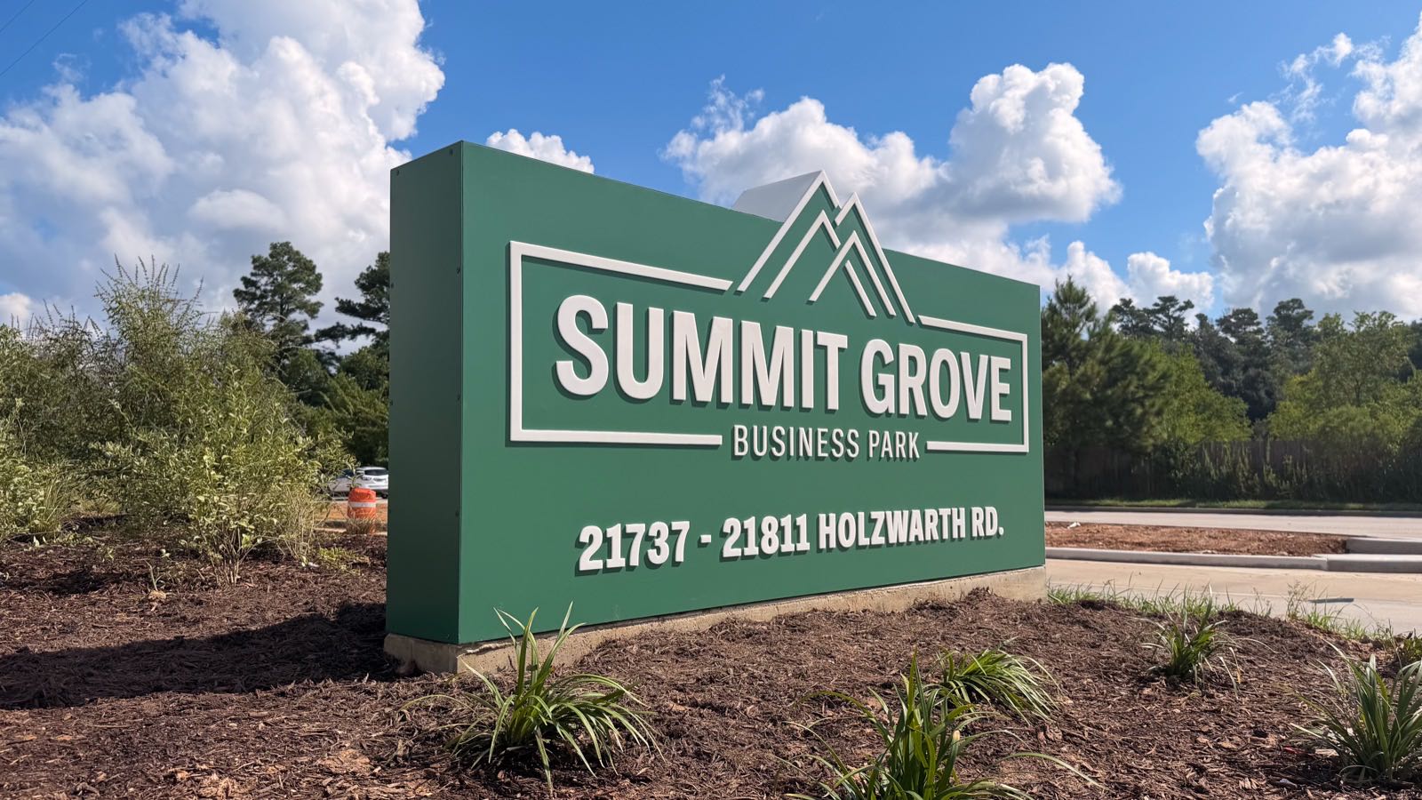 Green Summit Grove Business Park monument sign with white dimensional letters, made by M3 Graphics